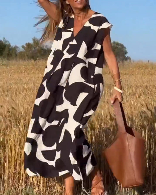 Stéphanie™ | Vestido estampado elegante y fluido con cuello en V