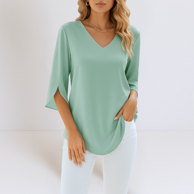Sophie™ | Elegante blusa con escote en pico y mangas abiertas