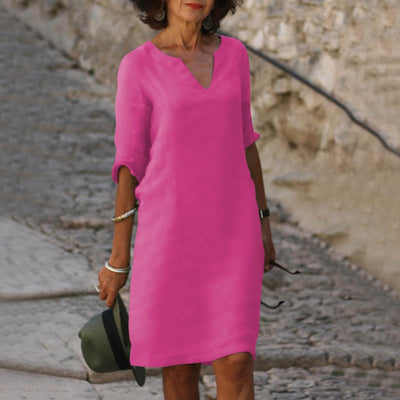 Amara – Vestido con cuello en V. Elegancia natural sin esfuerzo