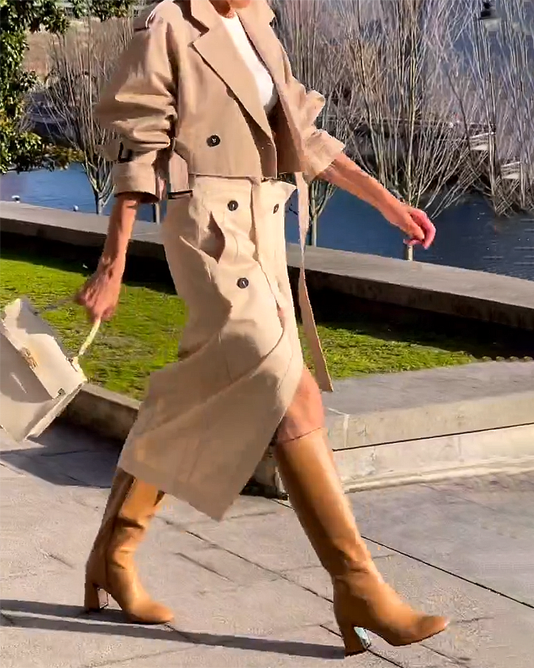 Elegante conjunto de dos piezas con abrigo y falda.